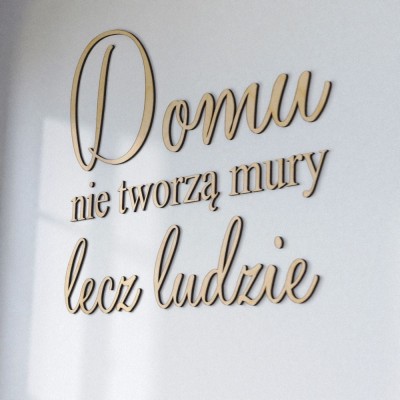 Napisy na ścianę Domu nie tworzą mury lecz ludzie