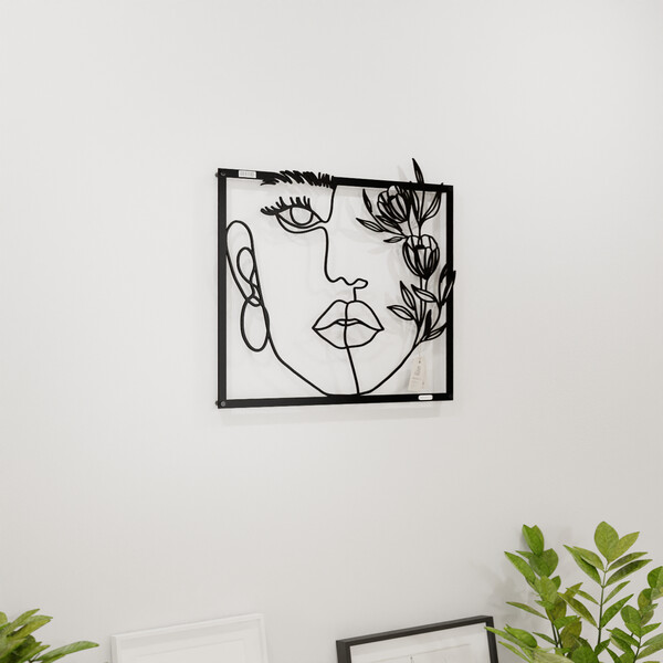 3001004 pięknie wycięte laserem Panel dekoracyjny twarz kobiety  na białej ścianie z czarnej płyty