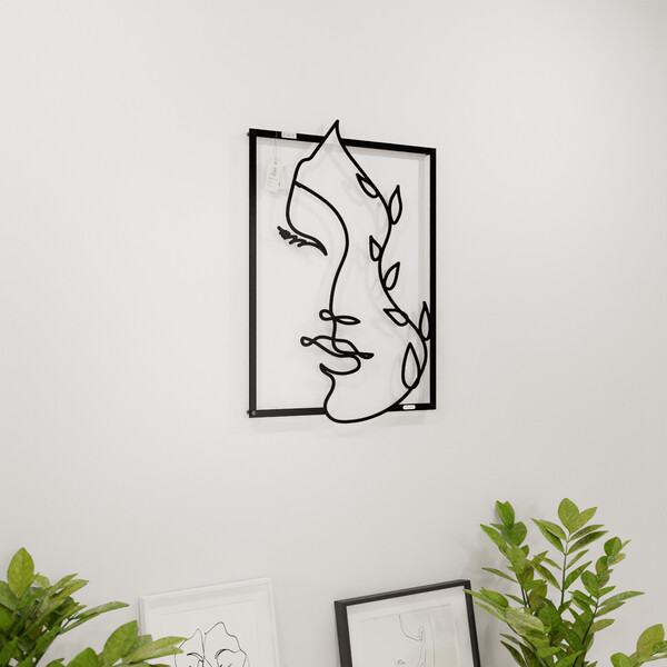 3001007 pięknie wycięte laserem Panel dekoracyjny twarz kobiety  na białej ścianie z czarnej płyty