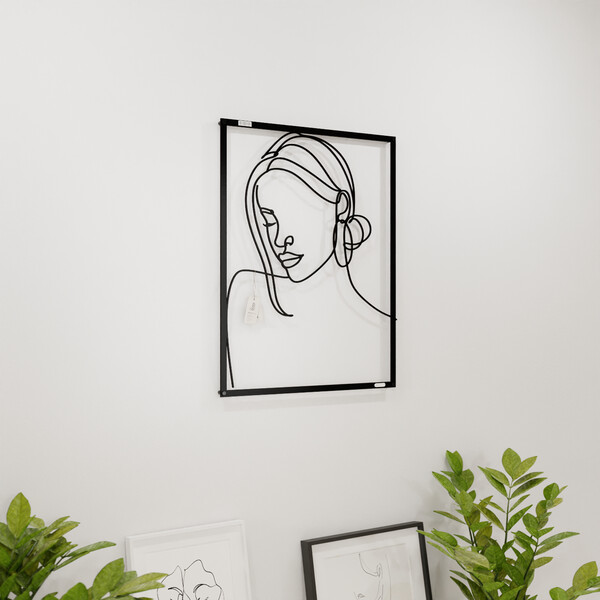3001018 pięknie wycięte laserem Panel dekoracyjny twarz kobiety  na białej ścianie z czarnej płyty