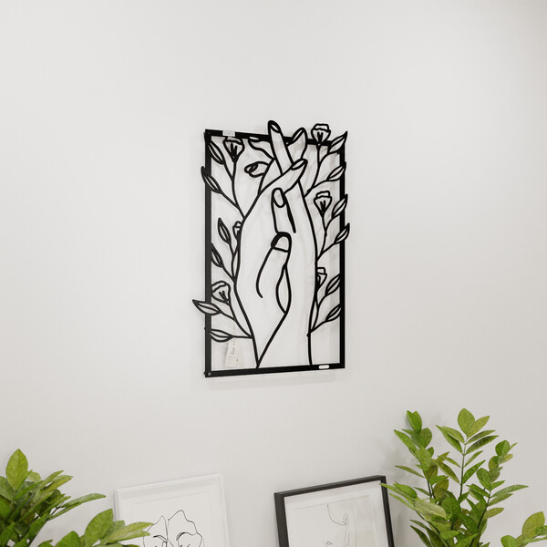 3001027 pięknie wycięte laserem Panel dekoracyjny splecione dłonie  na białej ścianie z czarnej płyty
