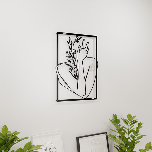 3001044 pięknie wycięte laserem Panel dekoracyjny ręka na twarzy  na białej ścianie z czarnej płyty