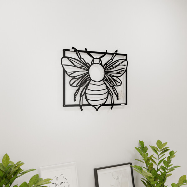 3001058 pięknie wycięte laserem Panel dekoracyjny pszczoła  na białej ścianie z czarnej płyty