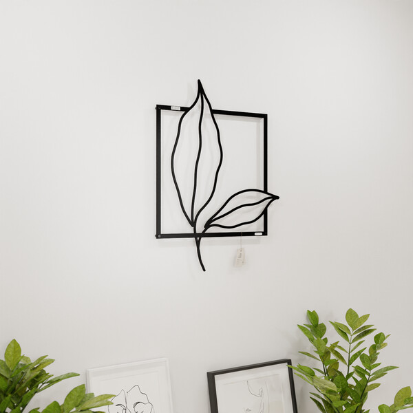 3001105 pięknie wycięte laserem Panel dekoracyjny dwa liście  na białej ścianie z czarnej płyty