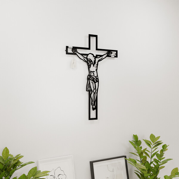 3001148 pięknie wycięte laserem Panel dekoracyjny Jezus na krzyżu  na białej ścianie z czarnej płyty