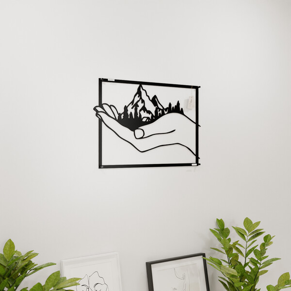 3001168 pięknie wycięte laserem Panel dekoracyjny góry na dłoni  na białej ścianie z czarnej płyty