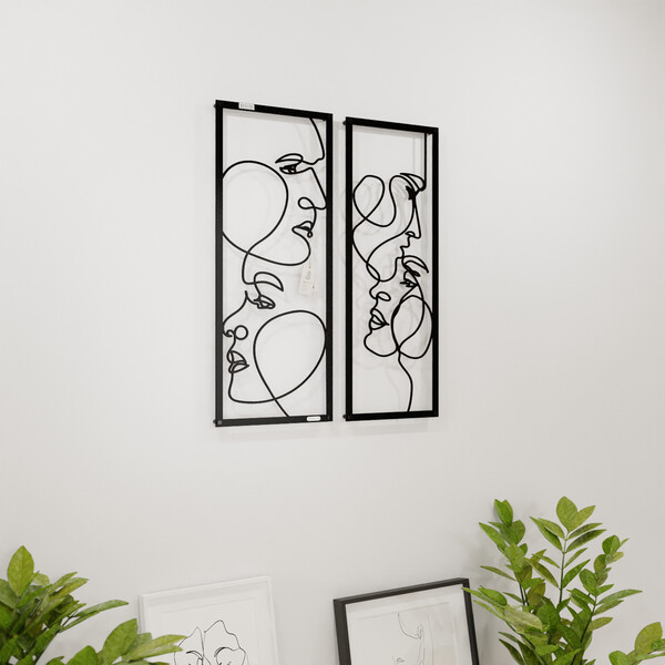 3001218 pięknie wycięte laserem Dyptyk ażurowy zakochani  na białej ścianie z czarnej płyty